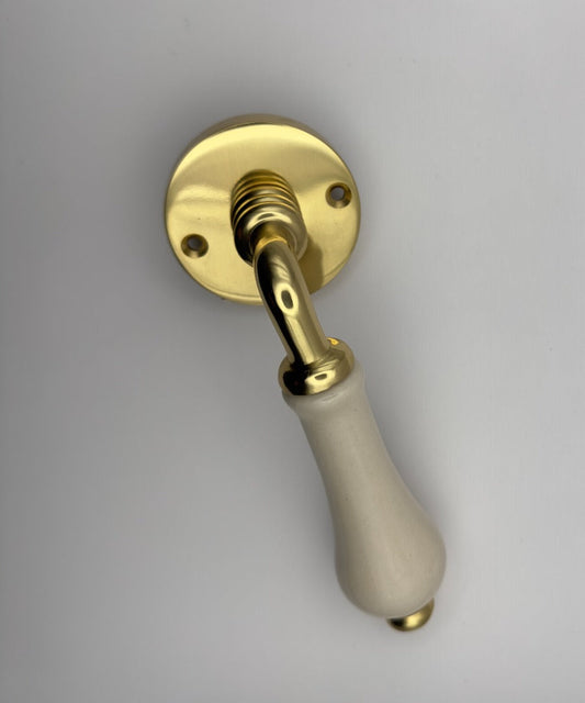 B&M Vintage Brass Lever on Rose with Ivory Porcelain Handle Polished Brass